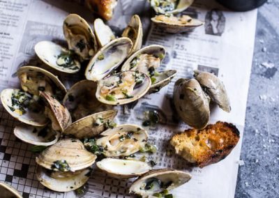 Grilled Clams with Charred Jalapeño Basil Butter.